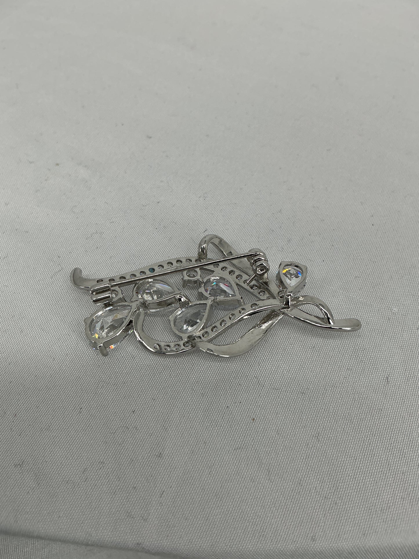 Fluid Radiance Swirl Brooch