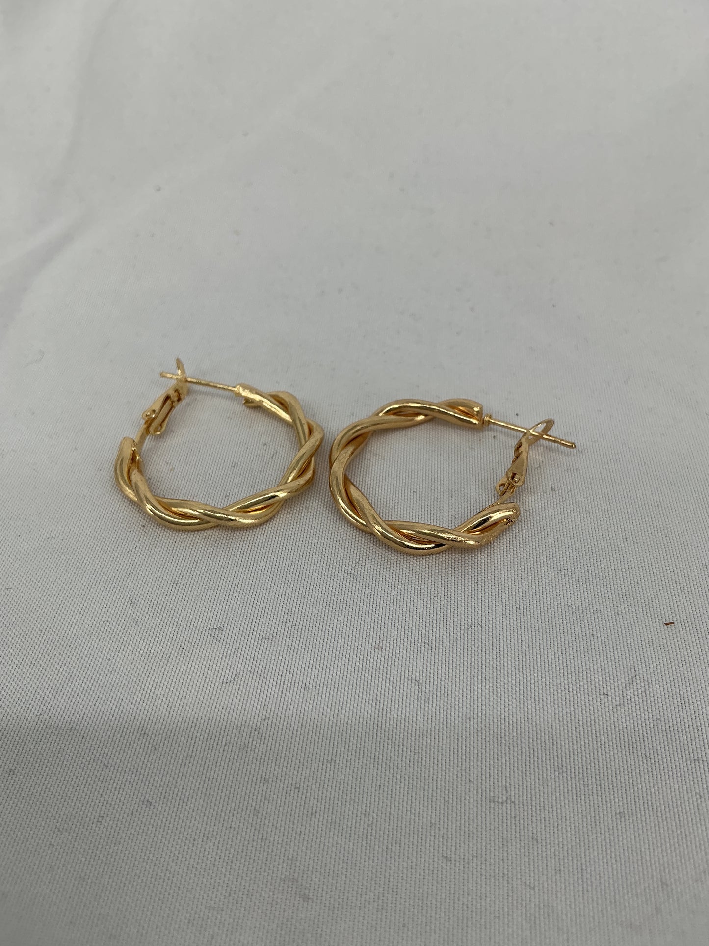 Gold twisted hoop earrings