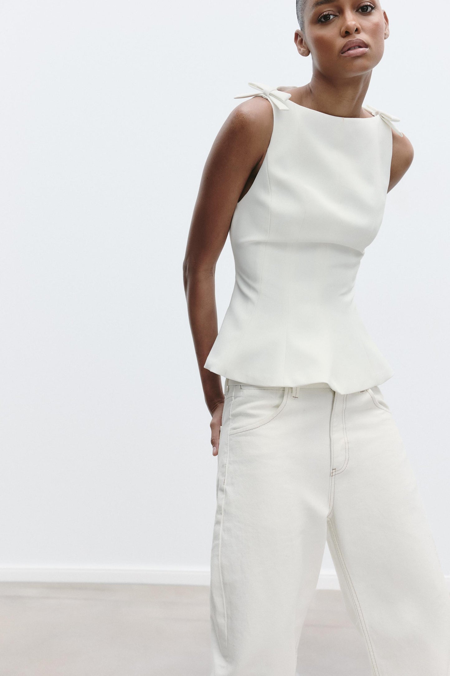 PEPLUM BOWS TOP size XS