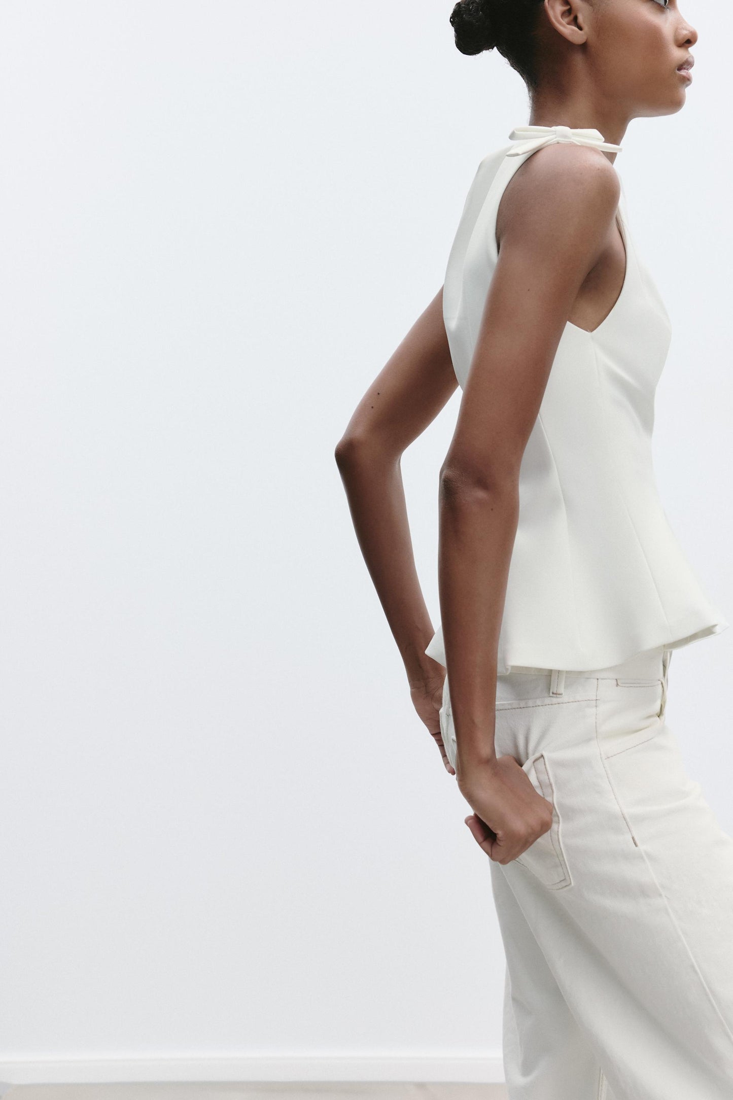 PEPLUM BOWS TOP size XS