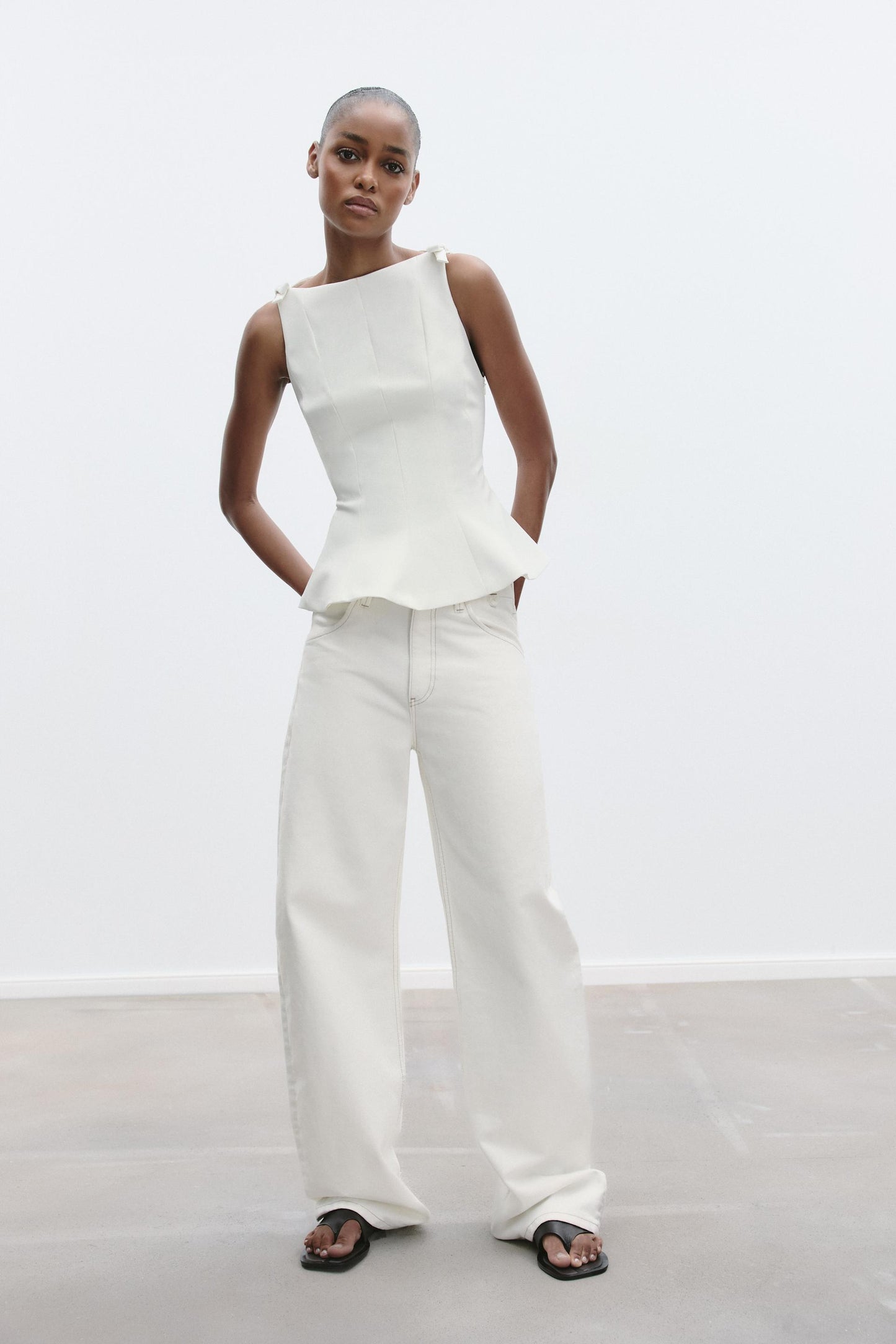 PEPLUM BOWS TOP size XS