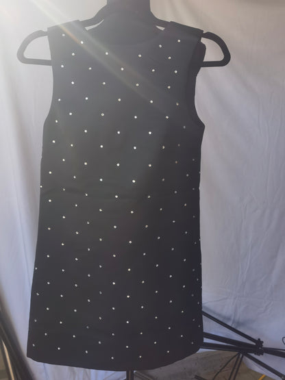 Women's black skirt with white embellishments, no size