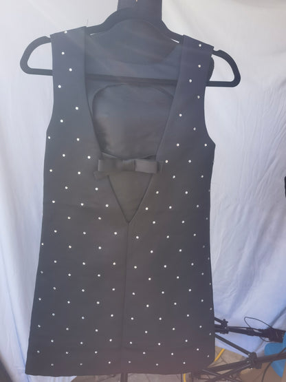 Women's black skirt with white embellishments, no size