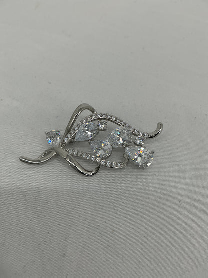 Fluid Radiance Swirl Brooch
