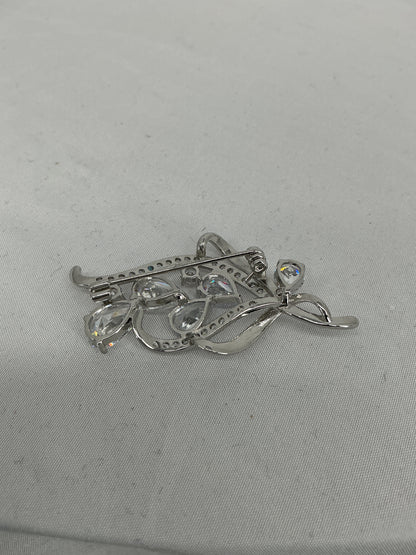 Fluid Radiance Swirl Brooch