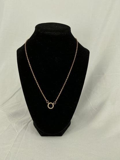 Gold circle pendant
