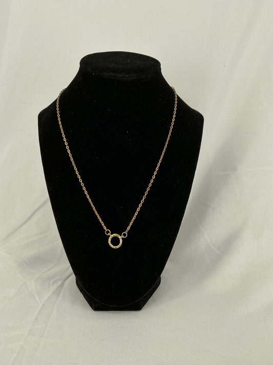 Gold circle pendant