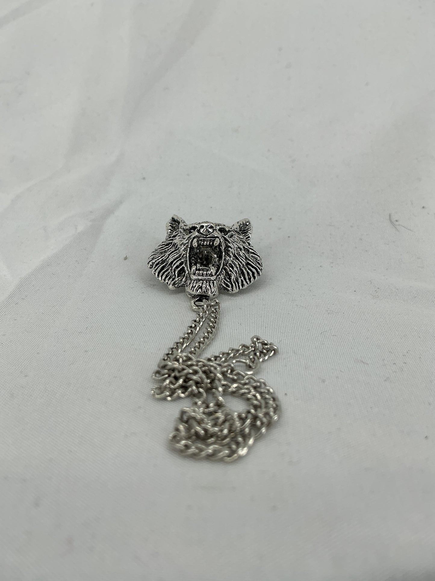 Silver wolf head chain badge/brooch