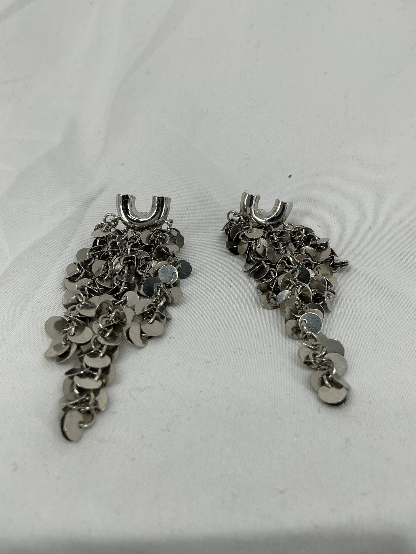 Silver sequined tassel earrings
