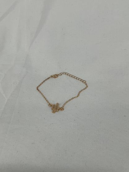 Gold-colored cactus-shaped bracelet