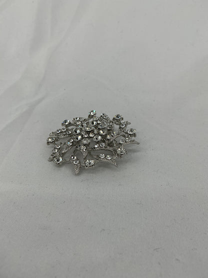 Silver radial rhinestone brooch