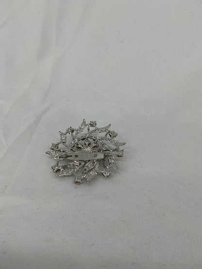 Silver radial rhinestone brooch